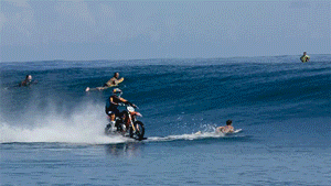blazepress:  Stunt Rider Surfs Giant Waves in Tahiti Using a Motorcycle