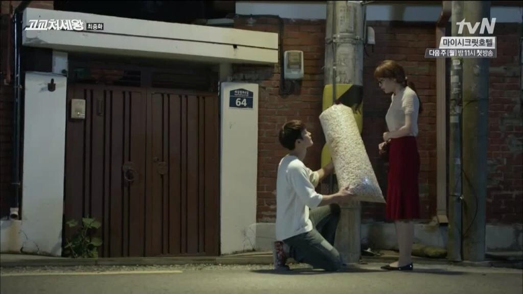 oucu:get on your knees and propose to someone with a large bag of popcorn