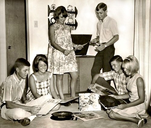 Group of teens listening to records,1960s