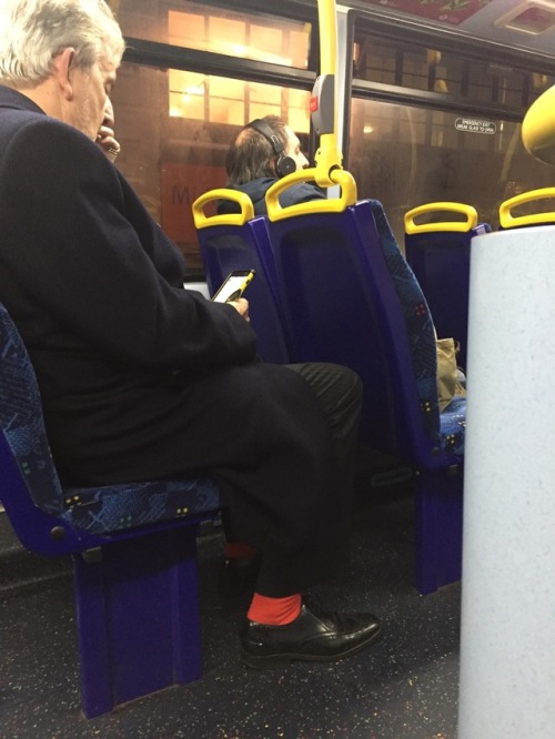 Daddy on the bus at Charring Cross. Love the red socks - very daring!