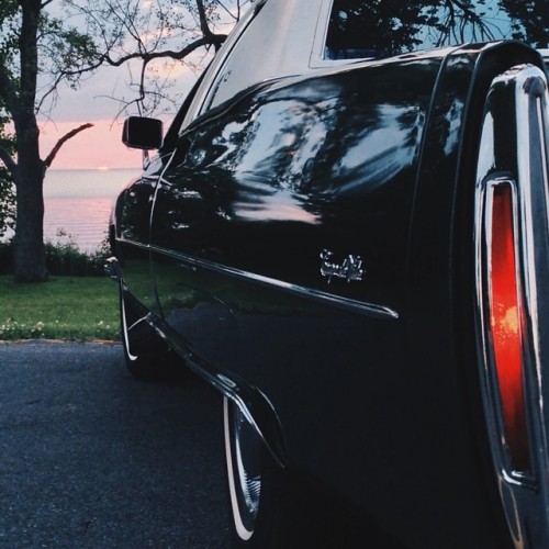 Lil in the light #vscocam #cadillac #coupedeville #1975 (at Sunset on the Shore of Lake Ontario)