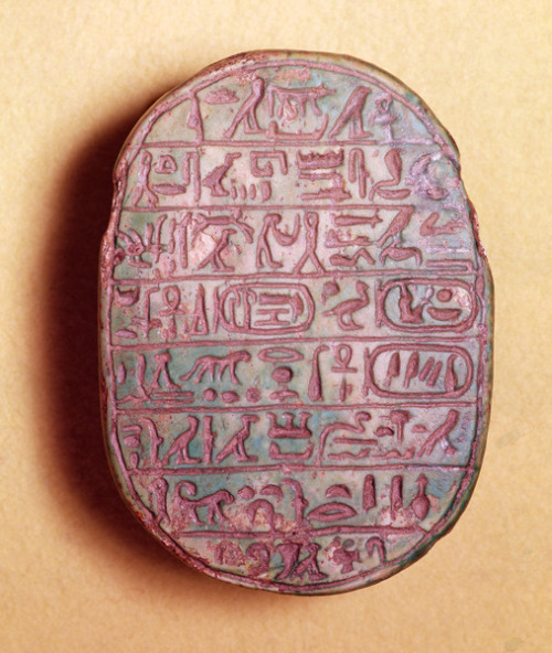 grandegyptianmuseum:Base of a marriage scarab of Amenhotep III (c.1391-1353 BC) and Queen Tiye. Now 