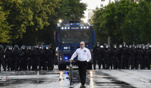 queeranarchism:  60 year old historian Martin Bühler (who identified himself to the press, I do not identify activists without consent) appears to ‘photobomb’ a lot of media images of the G20 in Hamburg. In reality he is a long time observer documenting