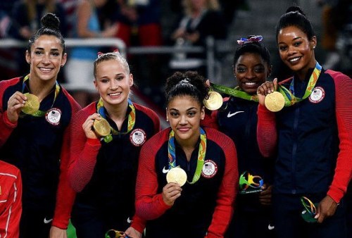 Gold medalists Alexandra Raisman, Madison Kocian, Lauren Hernandez, Simone Biles and Gabrielle Dougl