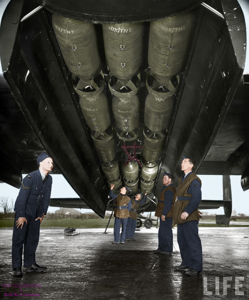 A british crew charge 1000 pounds inside a Avro Lancaster.The Avro Lancaster is a British four-engin