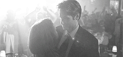 XXX evenstars:  Mulder: I love you. Scully: Oh, photo