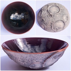 earthwoolfire:Moon bowl.  10.5&quot; diameter. 4&quot; high. Glazed black with a hint of red at the rim. Gold and silver lustred stars and galaxy within the middle. Underside is modelled to recreate the surface of our moon and is left unglazed. Available