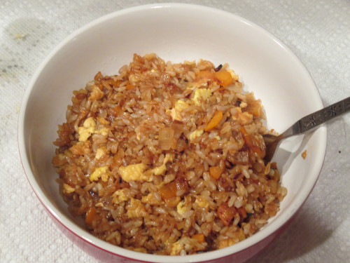 merrymacaron:  caffeinatedcrafting:  Who says you need to order carry out for fried rice? Ingredients: ½ Cup brown whole grain rice Onion, Diced Carrots, Diced 1 Egg Olive Oil Soy Sauce Vinegar Instructions: Steam Rice for 45 min, add a little