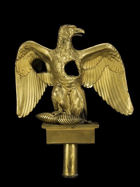 A French Imperial Eagle standard from the Napoleonic Wars, circa 1811.  Note the bullet holes in the