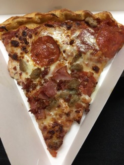 everybody-loves-to-eat:  Greasy ass mega meat pizza from Flying J truck stop.
