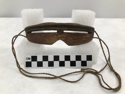 Snow spectaclesWood, sinew cordUnknown Inuit artisan, Northern Alaska, late 19th to early 20th centu