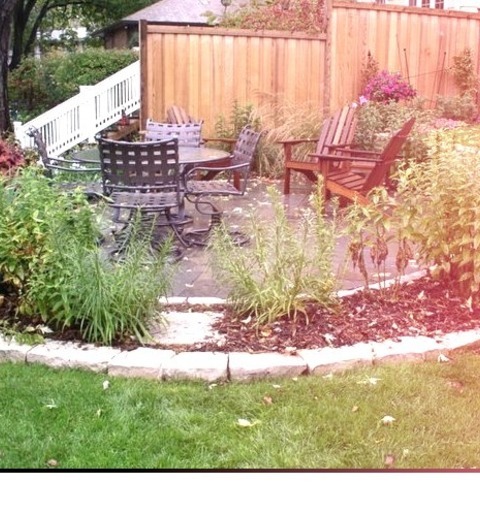 Minneapolis Retaining Walls LandscapePhoto Of A Large Traditional Full Sun Backyard Stone Landscaping