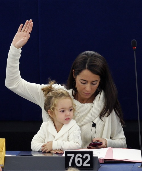 awaiting-my-escape:  cultureshift:  ceevee5:  blvcknvy:  Licia Ronzulli, member of the European Parliament, has been taking her daughter Vittoria to the Parliament sessions for two years now.  Every time this is on my dash, it’s an automatic reblog.