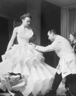 wehadfacesthen:  Christian Dior at work in his salon with model Jean Patchett, 1951, photo by Nat Farbman