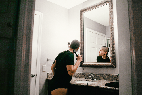 wordsandlostphotographs:  When I first shaved my hair I felt like I was starting over; I was younger but certain events in my life made me feel like I was carrying around a lot of negativity, and in shaving my head I found a way to restart. Since then,