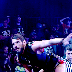 Johnny Gargano looking so hot even the referee can’t stop staring/licking his lips
