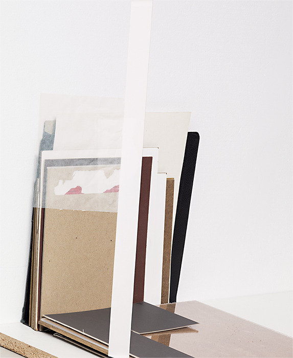 Phillip Maisel — STACK @@ Right Window
By E Dyer
There are photographs of stacks hanging on the walls. A physical stack rests on a raised platform as a window display. Paper, wood, plexiglass, MDF board, siding, mirrors and glass - all collapsed -...