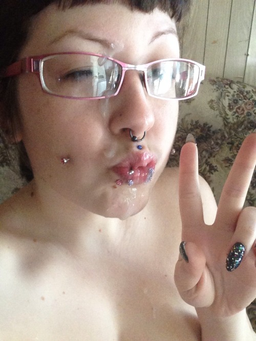 jizznation: Beautiful pierced satanicdokidoki shows off a facial from her man. what a grea