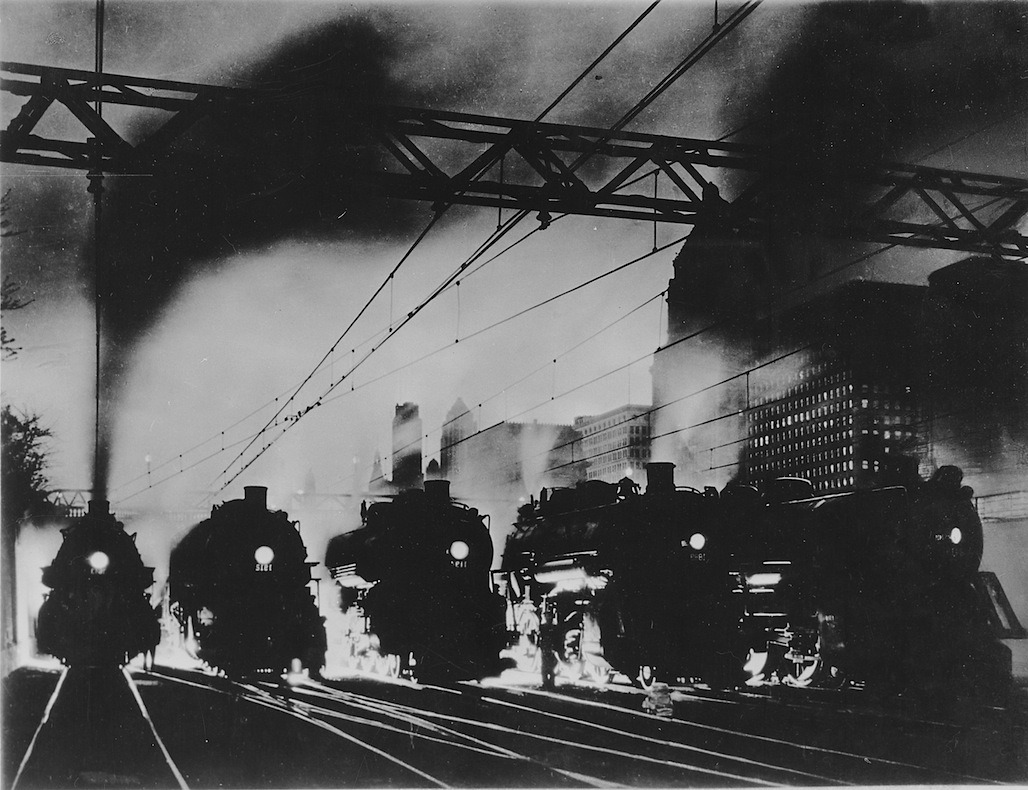 Unknown Photographer
Five steam locomotives, side by side, outbound from Chicago at dusk, ca. 1940