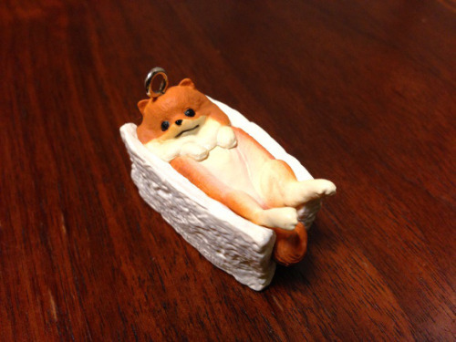 archiemcphee:  Remember those outrageously cute Banana Bird capsule toys we posted about a couple week ago? Meet their kawaii canine counterparts: Bread Dogs. Bandai created this adorable new series of Gashapon toys, which is actually their fifth series