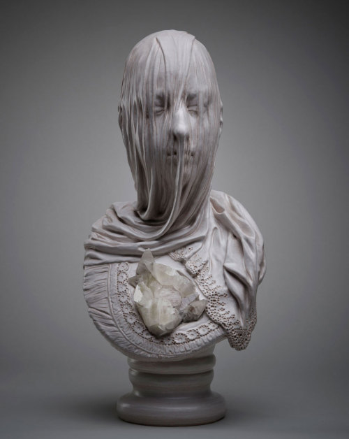 asylum-art:  The Veiled Ghosts of  Livio Scarpella The work of Italian contemporary artist Livio Scarpella turns good and evil into delicacy.  This group of sculptures, named “Ghosts Underground”, depicts lost souls anguishing beneath the effect