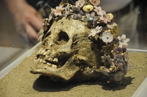 unexplained-events:  Girl buried with a crown of ceramic flowers.