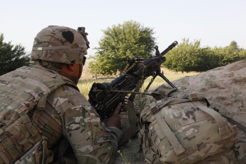 Porn militaryarmament:  A U.S Army soldier with photos