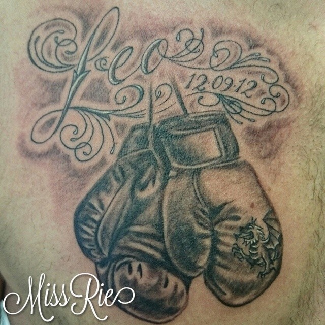 SIMONE CAMILLONI TATTOO  Realistic Irish boxing gloves hanging on a nail  a nice tribute to the green Ireland  Tributo alla verde Irlanda  Guantoni da boxe appesi al chiodo  STAY INKED   Facebook