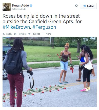 socialjusticekoolaid:  What they won’t show you on CNN tonight: Ferguson residents line a parade of roses down W Florissant, leading to where Mike Brown was taken from this world. #staywoke #powerful #insolidarity  