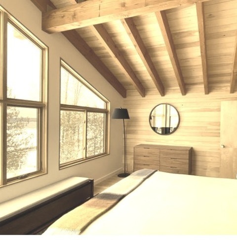 Wood - BedroomMid-sized Mountain Style Master Medium Tone Wood Floor, Exposed Beam And Wood Wall Bedroom