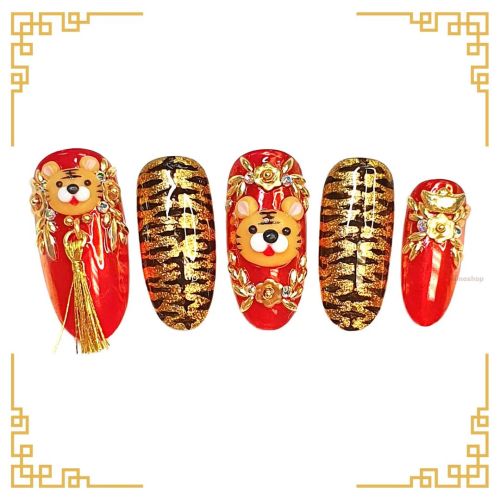 Happy Lunar New Year! #happynewyear #lunarnewyear #nailart #yearofthetiger #gelnails #nailsoftheday 