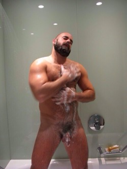 topshelfmen:  Musclebear in the shower. The soapy suds sliding over this stud’s hot body….STOP!