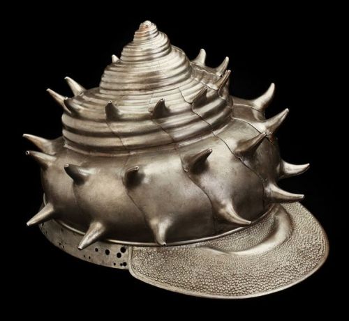 Nagasone Tojiro Mitsumasa, helmet in the form of a sea conch shell, 1618, iron with traces of lacque