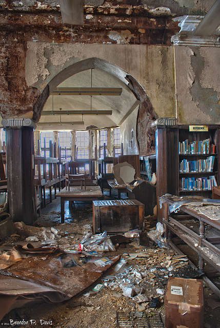 bookporn:  copperbadge:  kingsgrave:  bookporn:  Abandoned: Mark Twain Branch Detroit Public Library by Brandon P. Davis Flickr | Tumblr | Facebook  This is the way the world ends…  I always figured if the apocalypse does come, I’m heading for the