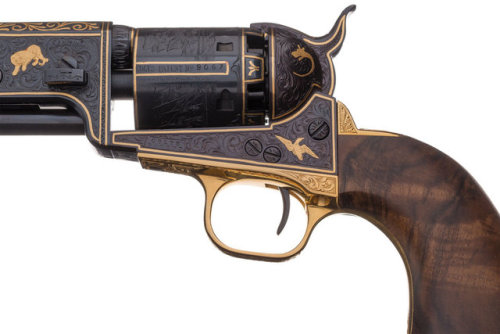 Engraved and gold inlaid pair of Colt Model 1851 percussion revolvers, by master engraver J.J. Adams