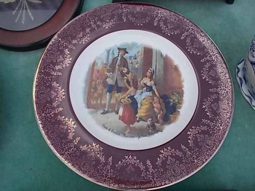 Decorative plates offered for sale during antiquities market - May/2022, Wroclaw, Poland.