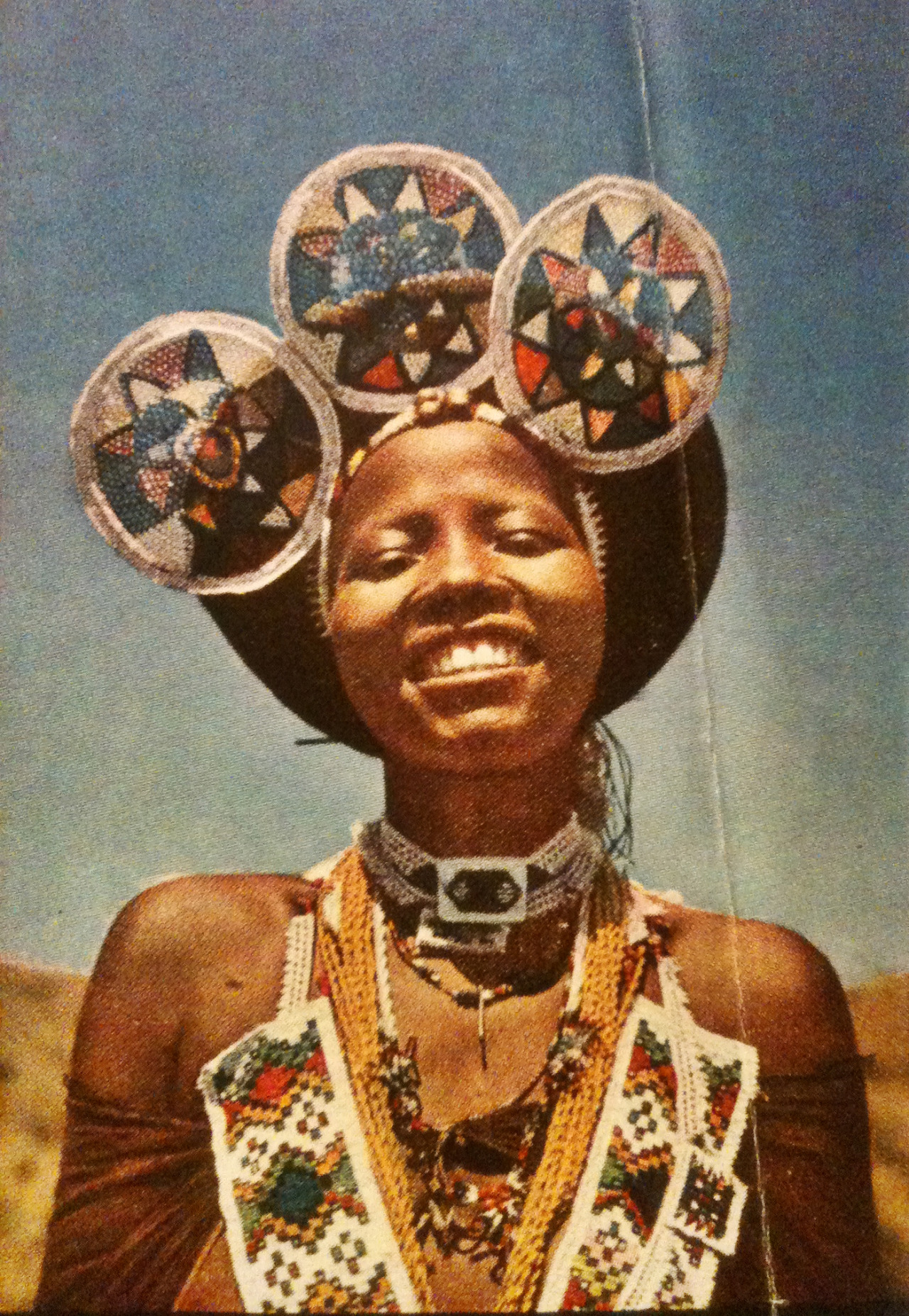 justenoughisplenty:  South Africa - Land of Contrast A Zulu girl smiles for the camera.
