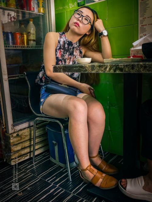 Girl in a small Korean restaurant, candid shot (Shanghai,...