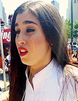 5harmonism:  Lauren climbing on a wall to greet fans and take pictures with them