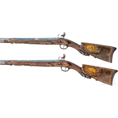 A matching pair of flintlock fowlers crafted by Johann Adreas Kuchenreuter of Regensburg, Germany, c