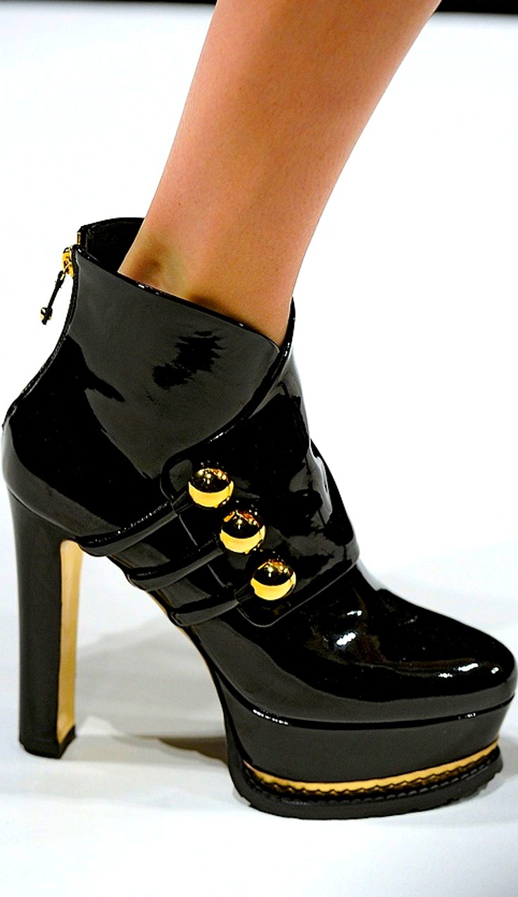    Moschino black patent leather platform ankle boots with gold details   