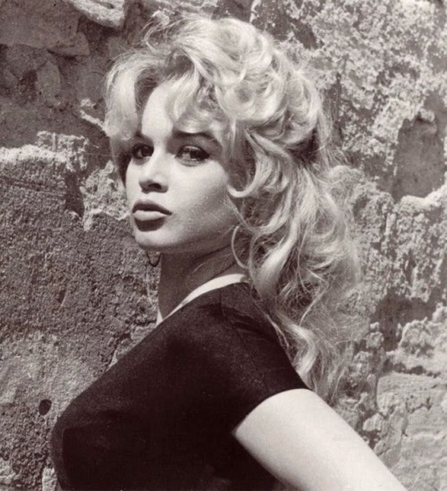 Brigitte Bardot on the set of La femme et le pantin (A Woman Like Satan), 1958.