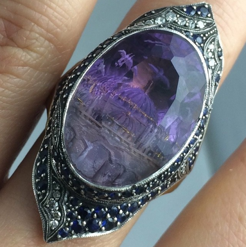 digg:  Sevan Bıçakçı makes RIDICULOUS jewelry. The images within the itmes are created by carving a 3D object out of the underside of the gem. Via Daily Dot 