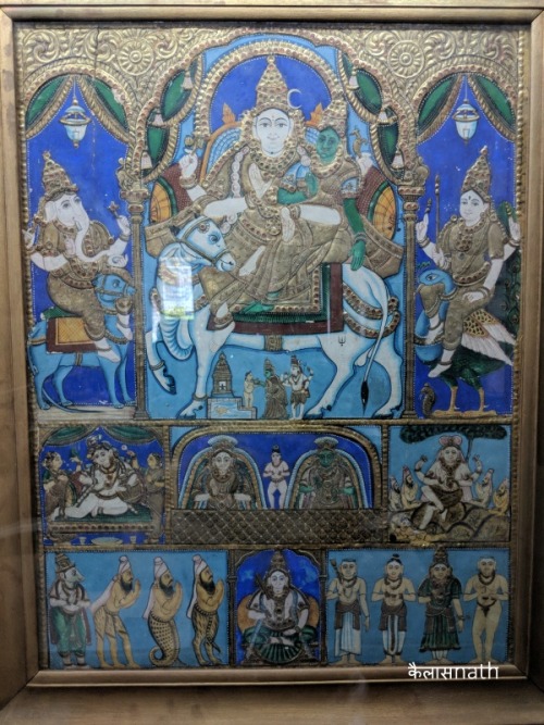 Shiva ParivarTanjore painting panel depicting Uma Maheshwara astride Nandi, flanked by Ganesha and S