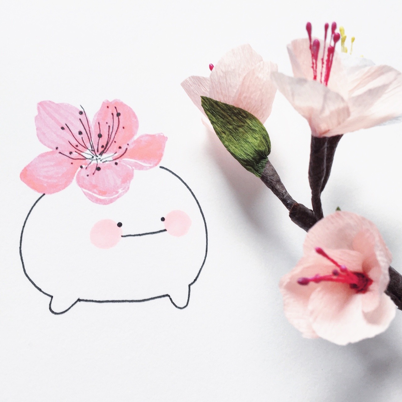 yoyothericecorpse:  hi bud is loving the paper cherry blossom branch I made (I MADE!!!!!)