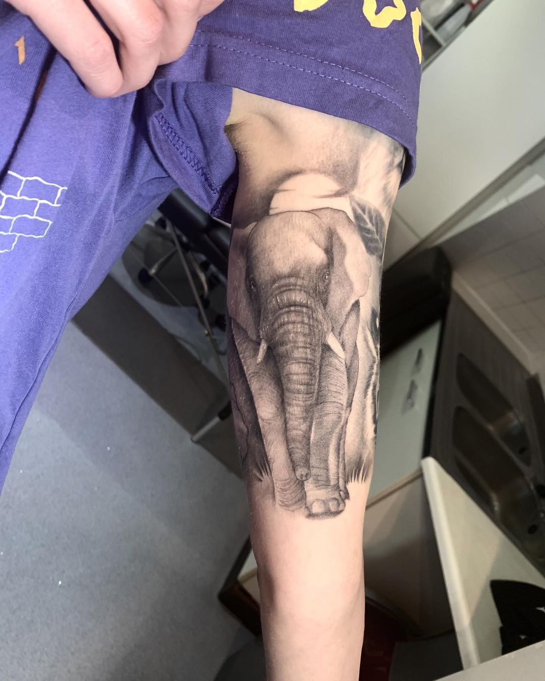 Giraffe And Elephant Tattoo On Leg
