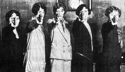 Bank employees of the Muncie, Indiana community bank practice pistol shooting in the basement’s pist