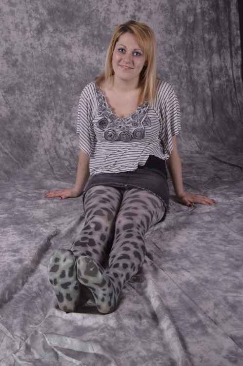 T in snow leopard tights.