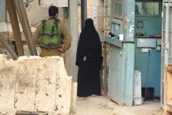 from-palestine:   The University bag that horrified the Coward Zionists 18 year old Palestinian university student Hadeel Hashlamoun from ‪#‎Hebron‬ asked to be frisked by a female occupation soldier. When she refused to be frisked by an israeli