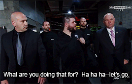 mithen-gifs-wrestling:  Kevin Owens is escorted from Raw–much to his annoyance.